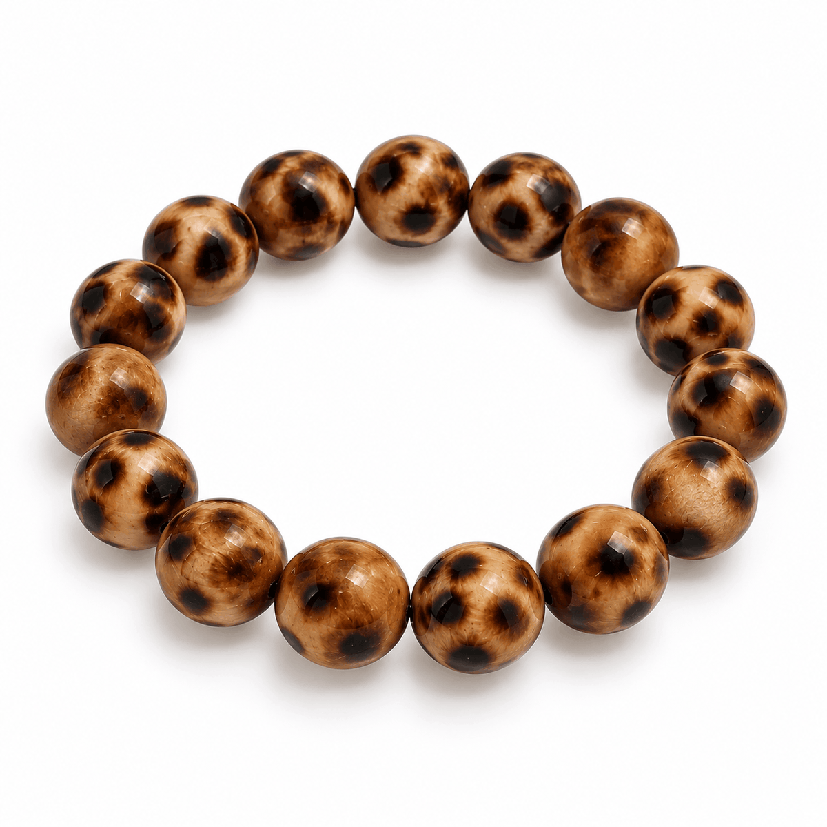 Amber kralenarmband met tijgeroogkleurige kralen en goudkleurige details van Hippe Kraal