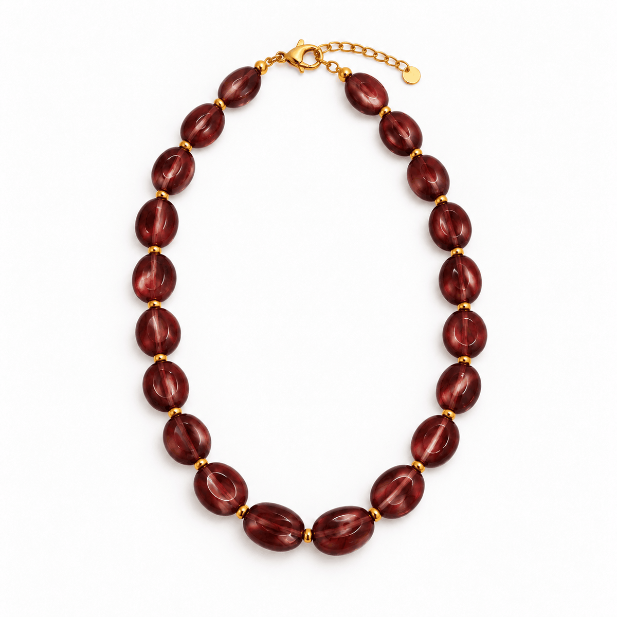 Burgundy kralenketting met goudkleurige details van Hippe Kraal